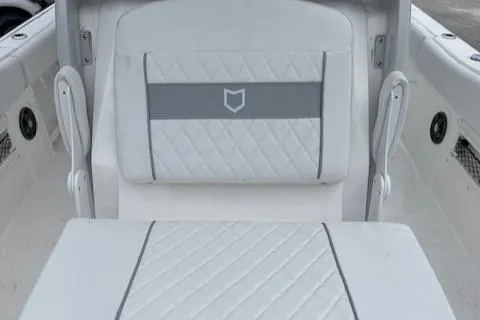 Slide: The Image of 2024 Sea Fox 268 Commander boat seating with diamond-stitched upholstery. - 11