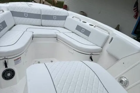 Slide: The Image of 2024 Sea Fox 268 Commander boat with white cushioned seating. - 13