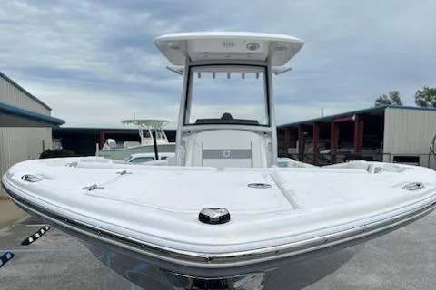 Slide: The Image of 2024 Sea Fox 268 Commander boat, front view at a marina. - 15
