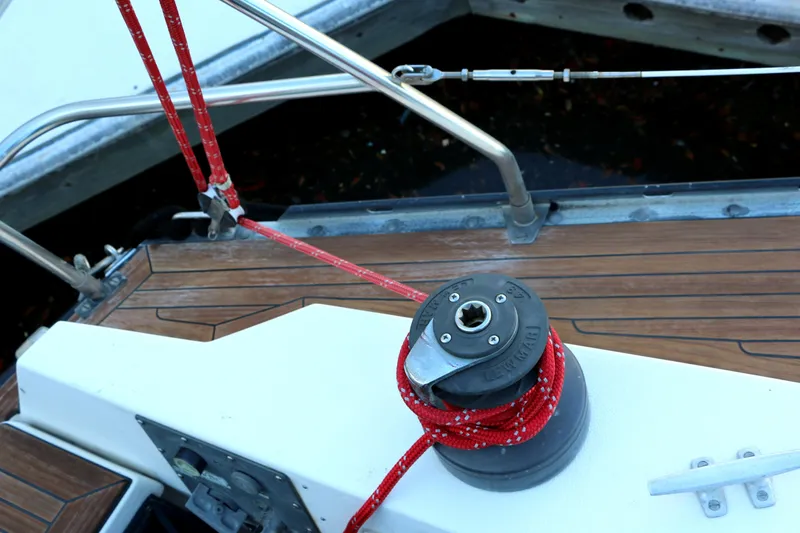 Slide: The Image of Baltic 35 sailboat deck with winch and red rope, 1985 model. - 10