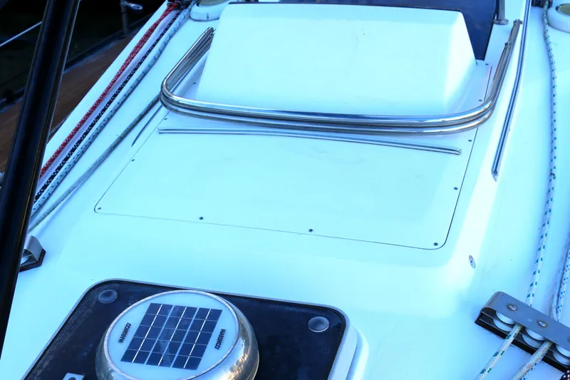 Slide: The Image of Close-up of the deck of a 1985 Baltic 35 sailboat with solar panel. - 17