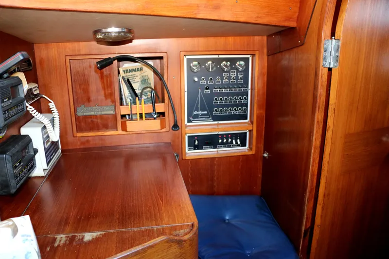 Slide: The Image of 1985 Baltic 35 yacht interior control panel and navigation station. - 31