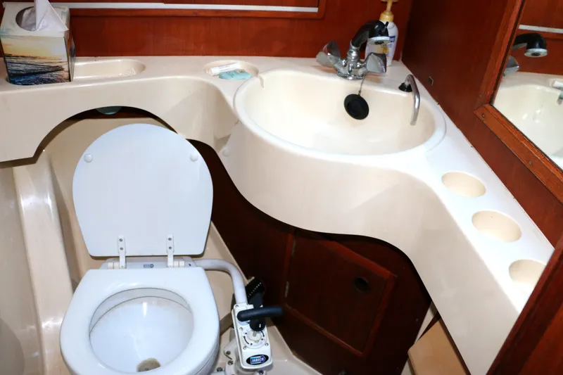 Slide: The Image of 1985 Baltic 35 yacht bathroom with toilet and sink - 34