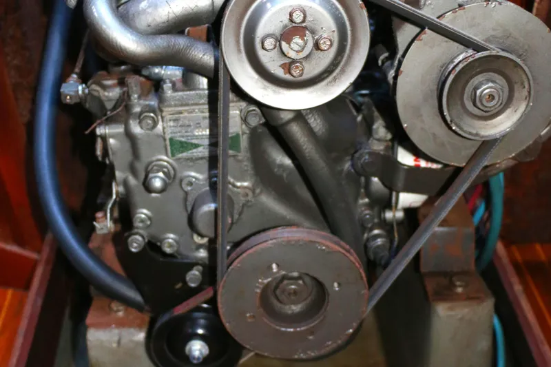 Slide: The Image of 1985 Baltic 35 engine compartment with visible belts and pulleys. - 41