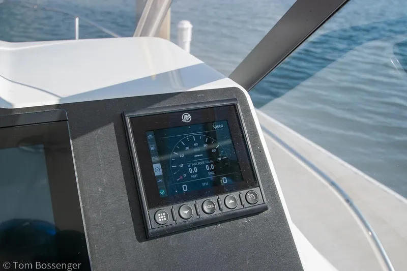 Slide: The Image of Beneteau Flyer 9 dashboard display, 2022 model, showing speedometer and controls. - 12
