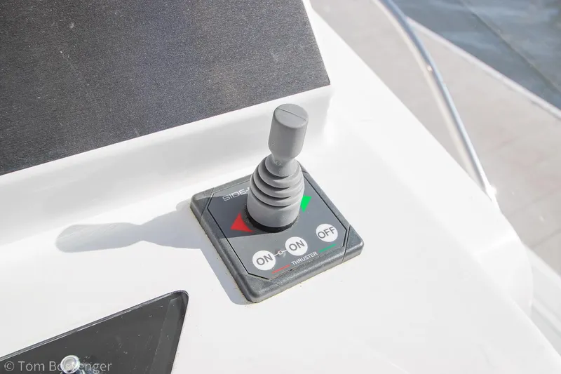 Slide: The Image of Joystick control on 2022 Beneteau Flyer 9 boat dashboard. - 13