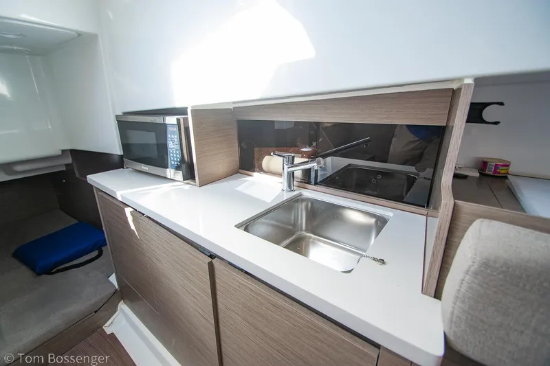 Slide: The Image of Modern kitchen area in 2022 Beneteau Flyer 9 boat with sink and microwave. - 18