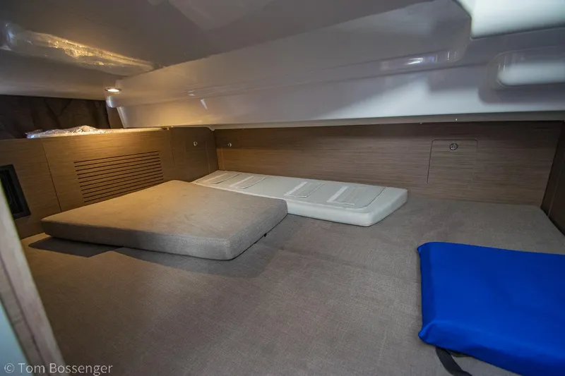 Slide: The Image of Interior cabin of 2022 Beneteau Flyer 9, featuring cozy sleeping area and cushions. - 19