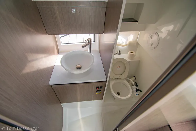 Slide: The Image of Beneteau Flyer 9 2022 bathroom interior with sink and toilet, featuring modern design. - 21