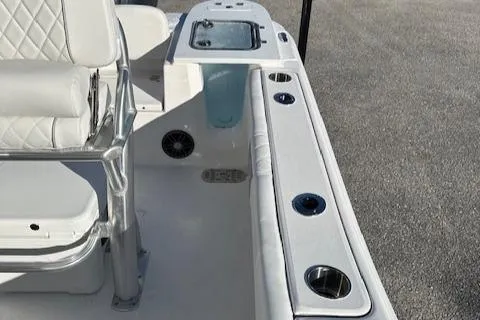 Slide: The Image of 2024 Sea Fox 228 Commander boat interior with seating and cup holders. - 12