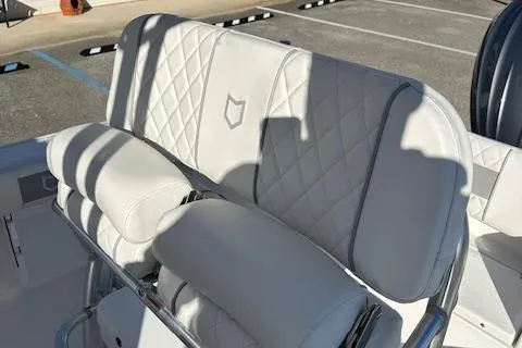 Slide: The Image of 2024 Sea Fox 228 Commander boat with white diamond-stitched seating. - 13