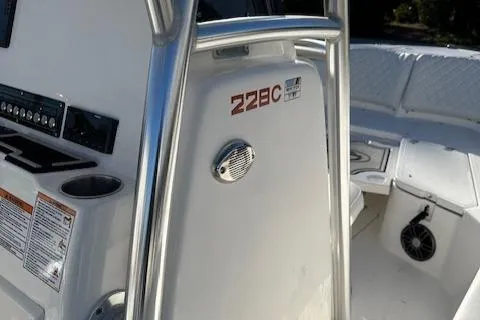 Slide: The Image of 2024 Sea Fox 228 Commander boat interior with seating and control panel. - 16