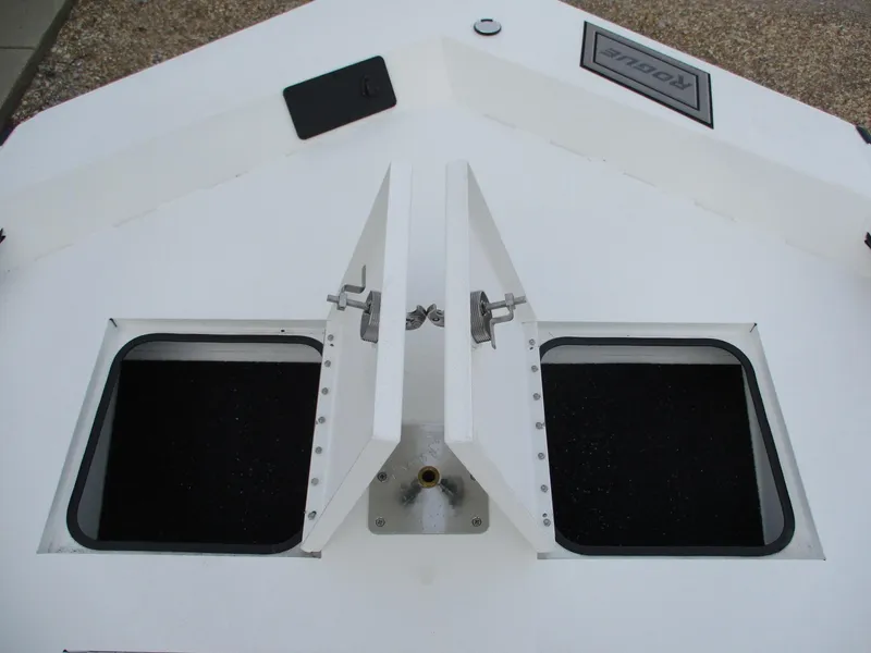 Slide: The Image of 2024 Avid 18 Rogue CC boat storage compartments. - 12