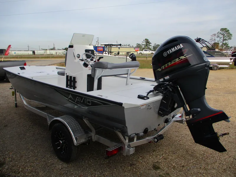 Slide: The Image of 2024 Avid 18 Rogue CC boat with Yamaha outboard motor on trailer. - 3