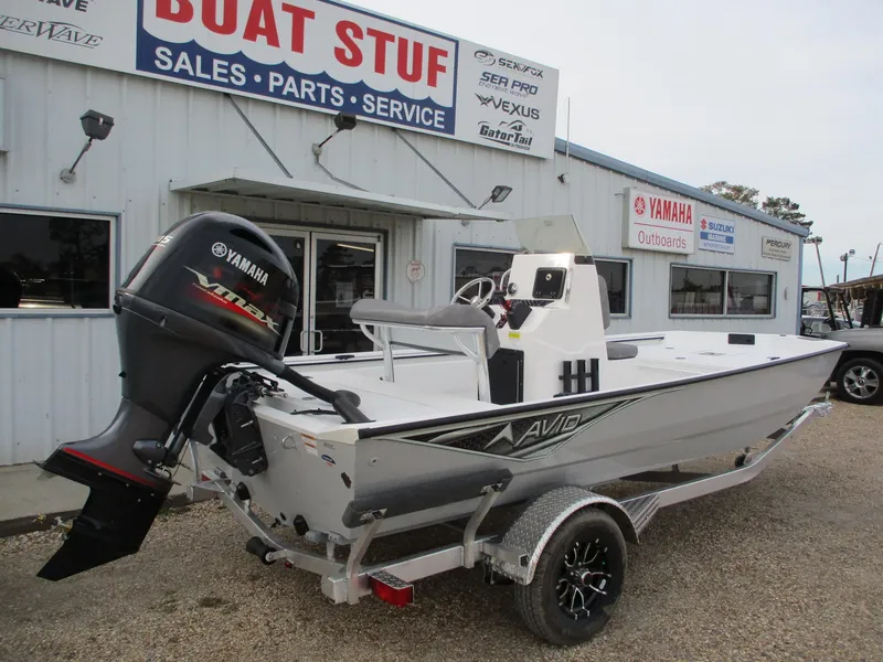 Slide: The Image of 2024 Avid 18 Rogue CC boat with Yamaha outboard motor at dealership. - 5