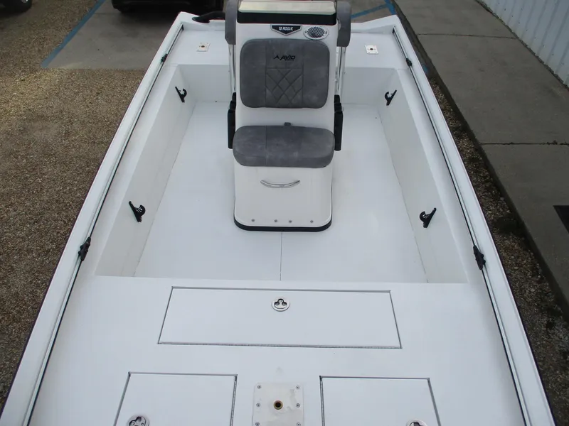 Slide: The Image of 2024 Avid 18 Rogue CC boat interior with center console and seating. - 6