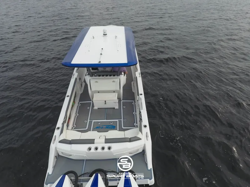 Slide: The Image of 2021 Nor-Tech 390 Sport boat on open water, aerial view. - 23
