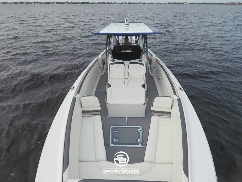 Slide: The Image of 2021 Nor-Tech 390 Sport boat on open water, aerial view. - 25