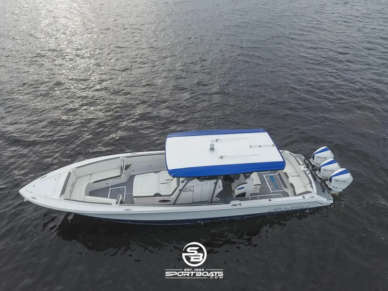 Slide: The Image of 2021 Nor-Tech 390 Sport boat on water, aerial view. - 30