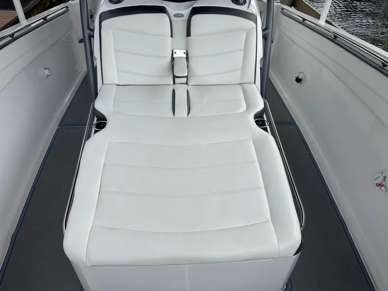 Slide: The Image of 2021 Nor-Tech 390 Sport boat with white cushioned seating. - 42