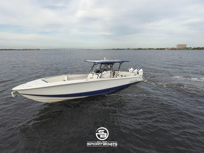 Slide: The Image of 2021 Nor-Tech 390 Sport boat cruising on open water. - 7