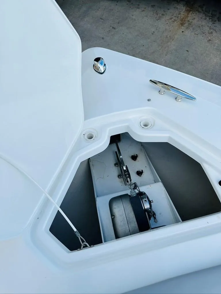 Slide: The Image of 2015 Cruisers Sport Series 328 anchor locker and windlass system. - 14