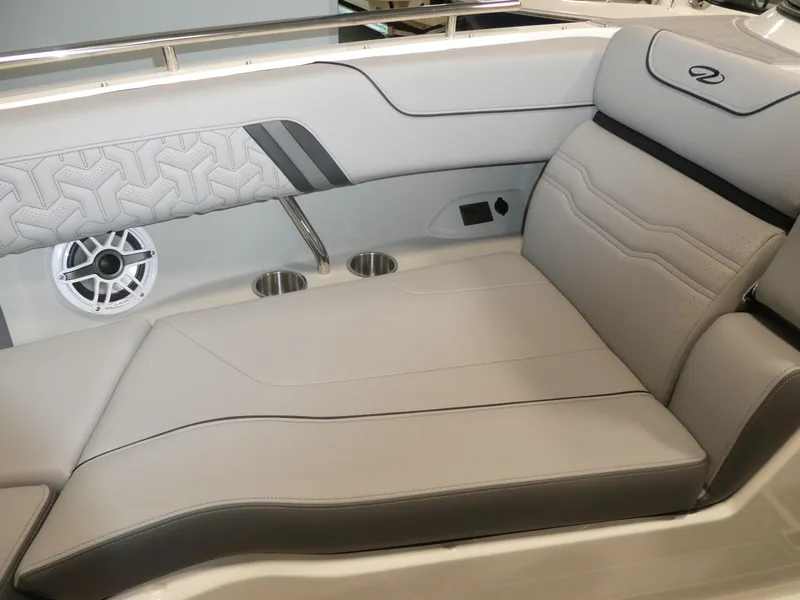 Slide: The Image of 2024 Regal LX9 boat interior with luxurious seating and built-in speakers. - 27