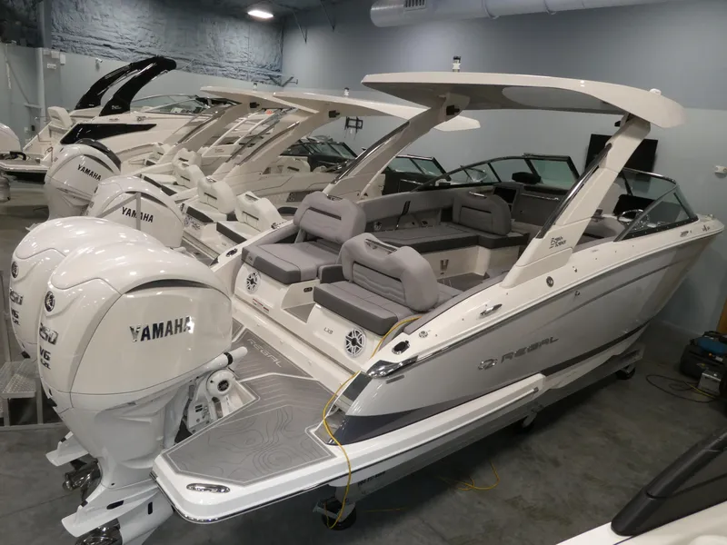 Slide: The Image of 2024 Regal LX9 boat with Yamaha engines in showroom. - 5