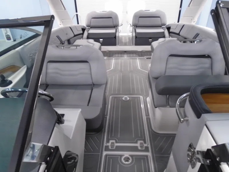 Slide: The Image of 2024 Regal LX9 boat interior with luxurious seating and modern design. - 7