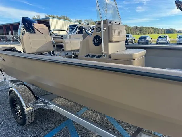 Slide: The Image of 2024 SeaArk 2072 VFX Elite CC boat on trailer, side view. - 9