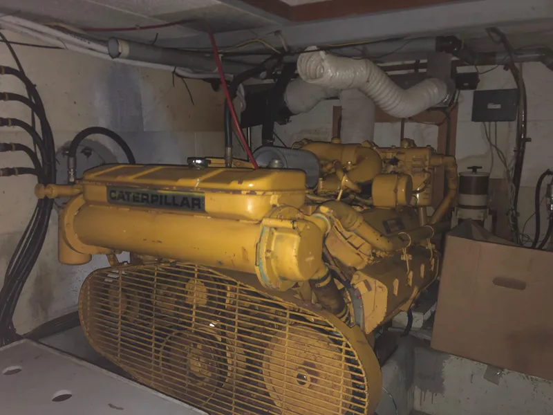 Slide: The Image of 1985 CHB Motor Yacht engine room with Caterpillar engine. - 22