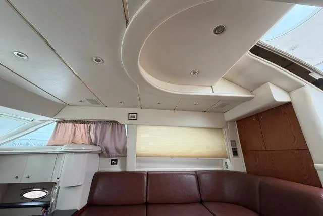 Slide: The Image of Interior of 2000 Maxum 4100 SCA yacht with leather seating and modern design. - 77