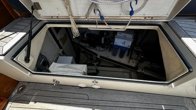 Slide: The Image of Open hatch of a 2004 Lyman-Morse Sparkman & Stephens Sloop showing interior equipment. - 12