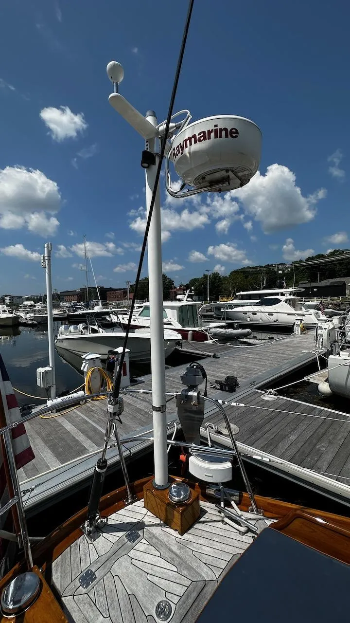 Slide: The Image of 2004 Lyman-Morse Sparkman & Stephens Sloop docked at marina under blue sky - 18