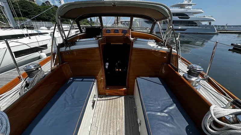 Slide: The Image of Cockpit of a 2004 Lyman-Morse Sparkman & Stephens Sloop at a marina. - 19