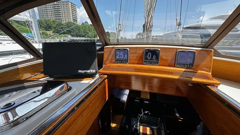 Slide: The Image of Cockpit of 2004 Lyman-Morse Sparkman & Stephens Sloop with Raymarine navigation system. - 21
