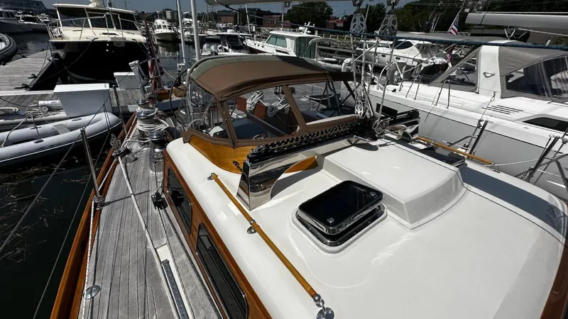 Slide: The Image of 2004 Lyman-Morse Sparkman & Stephens Sloop docked at a marina. - 22
