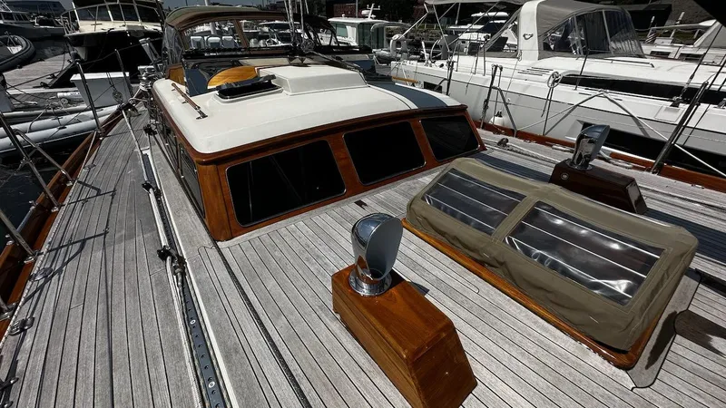 Slide: The Image of 2004 Lyman-Morse Sparkman & Stephens Sloop deck with wooden accents and skylights. - 23