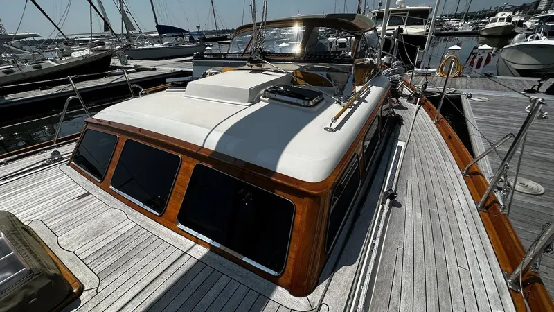 Slide: The Image of 2004 Lyman-Morse Sparkman & Stephens Sloop docked at a marina. - 24