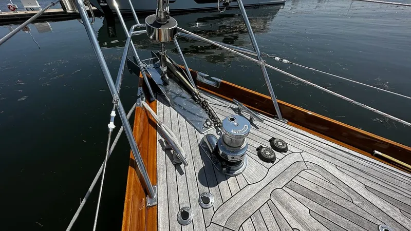 Slide: The Image of Deck of 2004 Lyman-Morse Sparkman & Stephens Sloop with anchor windlass. - 32