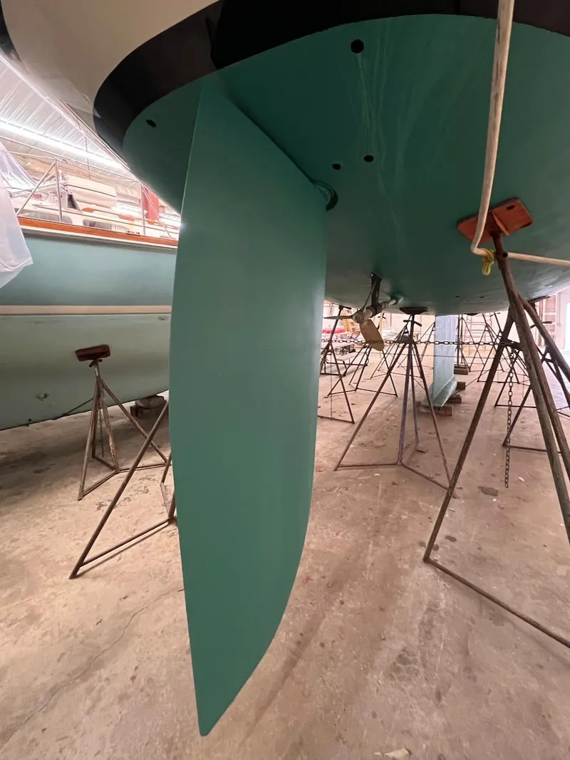 Slide: The Image of Lyman-Morse Sparkman & Stephens Sloop 2004 in dry dock, showing keel and rudder. - 33