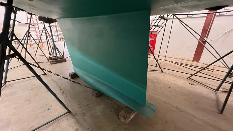 Slide: The Image of Lyman-Morse Sparkman & Stephens Sloop 2004 keel in dry dock for maintenance. - 36