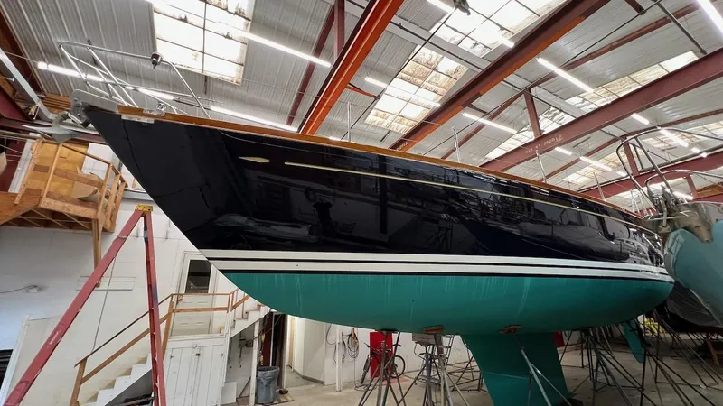 Slide: The Image of Lyman-Morse Sparkman & Stephens Sloop 2004 in a boatyard for maintenance. - 39