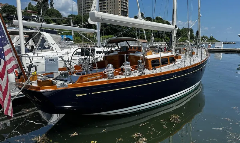Slide: The Image of 2004 Lyman-Morse Sparkman & Stephens Sloop docked at a marina. - 4