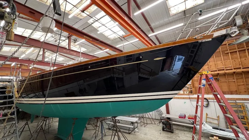 Slide: The Image of Lyman-Morse Sparkman & Stephens Sloop 2004 in a boatyard for maintenance. - 40