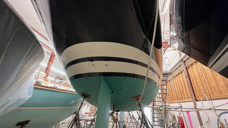 Slide: The Image of Lyman-Morse Sparkman & Stephens Sloop 2004 in dry dock, showing hull and keel. - 43