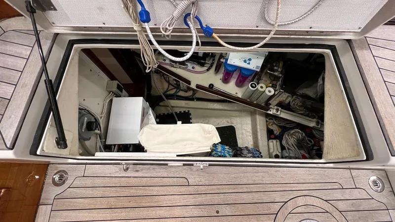 Slide: The Image of Open storage compartment on a 2004 Lyman-Morse Sparkman & Stephens Sloop. - 44