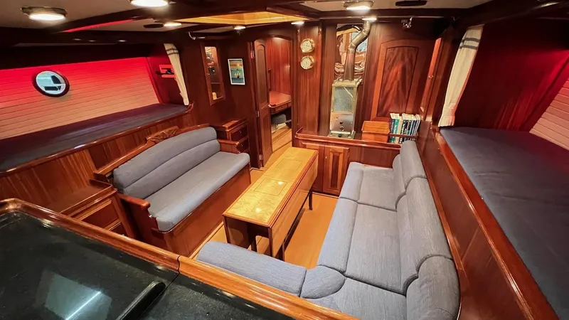Slide: The Image of Luxurious interior of 2004 Lyman-Morse Sparkman & Stephens Sloop with wooden finish and cozy seating. - 47