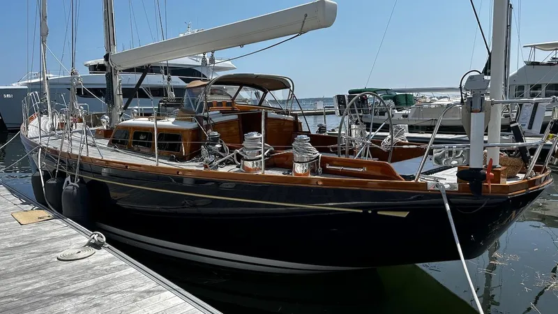 Slide: The Image of 2004 Lyman-Morse Sparkman & Stephens Sloop docked at marina. - 5
