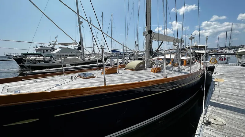 Slide: The Image of Lyman-Morse Sparkman & Stephens Sloop 2004 docked at marina with other boats. - 6